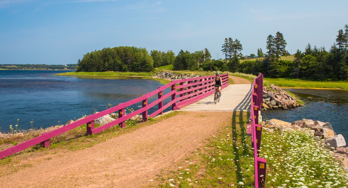 Confederation Trail St Peters, bridge, biker Confederation Trail St Peters, bridge, biker