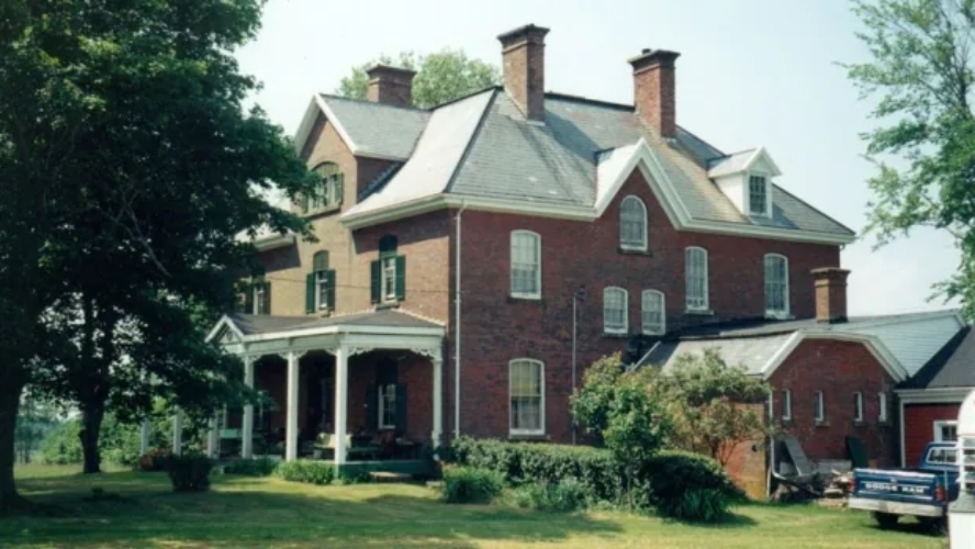 Glenaladale Outside view of the large brick house that is Glenaladale House